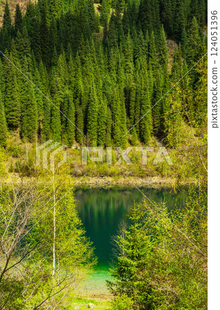 Summer lake kaindy in almaty. clean water in the mountains of kazakhstan Summer lake kaindy in almaty. clean water in the mountains of kazakhstan 124051396