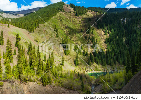 Summer lake kaindy in almaty. clean water in the mountains of kazakhstan Summer lake kaindy in almaty. clean water in the mountains of kazakhstan 124051413