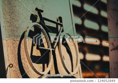 Abstract artistic background with vintage two wheeler bike on seaside background. Traveling to a beach in summer. Double exposure. Summertime ride. 124052849