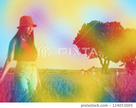 Retro photo of a woman wearing a hat standing in a summer field. Retro female portrait in hippie style 1970s. Summertime journey. Colourful colours. Retro photo of a woman wearing a hat standing in a summer field. Retro female portrait in hippie style 1970s. Summertime journey. Colourful colours. 124053005