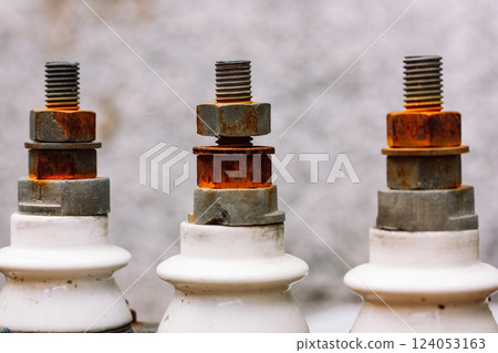 Old rusty bolts, steel nuts on white background. A large rusted bolt with screw. Part of a metal construction. Securing Metal. Closeup of rusted bolt. Old rusty bolts, steel nuts on white background. A large rusted bolt with screw. Part of a metal construction. Securing Metal. Closeup of rusted bolt. 124053163