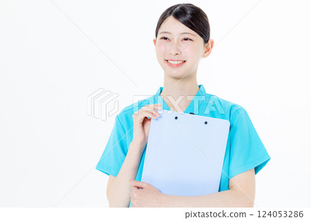 Nurse holding a medical record Nurse holding a medical record 124053286