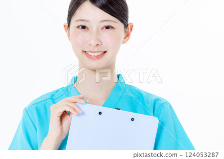 Nurse holding a medical record Nurse holding a medical record 124053287
