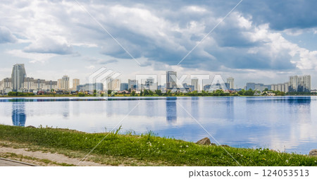 Water view of buildings with the water of river in the foreground 124053513