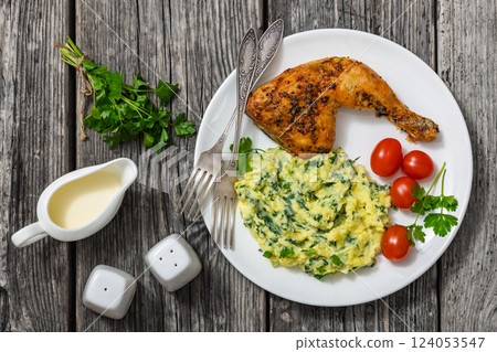 colcannon with kale with roasted chicken leg 124053547