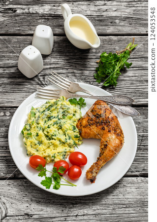 colcannon with kale with roasted chicken leg colcannon with kale with roasted chicken leg 124053548