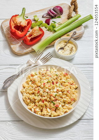macaroni salad with celery, eggs, red bell pepper macaroni salad with celery, eggs, red bell pepper 124053554