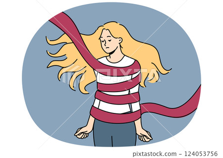Woman hostage tied with rope is sad and clenches fists, feeling helplessness and crippling apathy 124053756