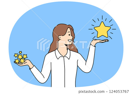 Woman holds rating stars in hands and chooses what rating to give to store or restaurant Woman holds rating stars in hands and chooses what rating to give to store or restaurant 124053767