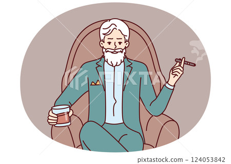 Elderly man aristocrat sits in armchair in expensive formal suit and drinks brandy with cigar 124053842