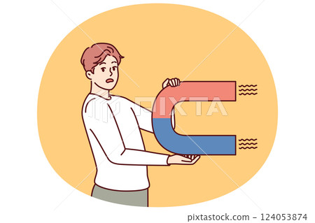 Worried man with magnet looks scared at screen for concept of trying to attract customers to company Worried man with magnet looks scared at screen for concept of trying to attract customers to company 124053874