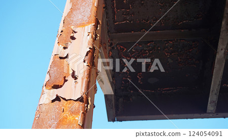 Rusty and dilapidated steel exterior stairs Rusty and dilapidated steel exterior stairs 124054091