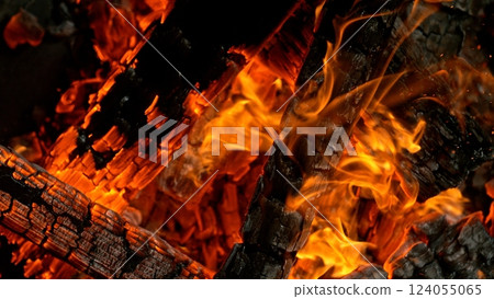 Close-up of Hot Embers with Flying Sparks . Concept of heating grills or ovens 124055065