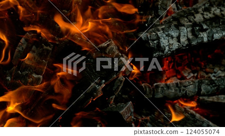 Close-up of Hot Embers with Flying Sparks . Concept of heating grills or ovens 124055074