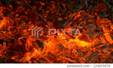 Close-up of Hot Embers with Flying Sparks . Concept of heating grills or ovens 124055078