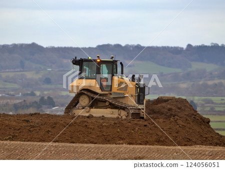 Bulldozer moving earth Bulldozer moving earth 124056051