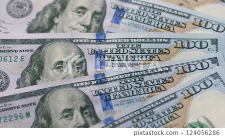 A Detailed CloseUp of U.S. Hundred Dollar Bills and Their Significance in the Economy 124056286