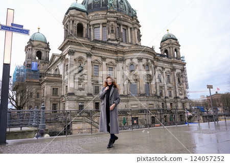 Woman Walking Near Berlin Cathedral in Winter Woman Walking Near Berlin Cathedral in Winter 124057252