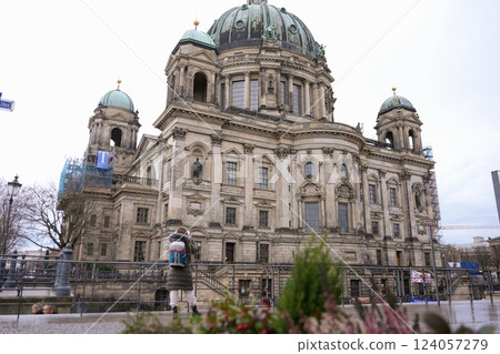 Tourist Admiring Berlin Cathedral in Winter Tourist Admiring Berlin Cathedral in Winter 124057279