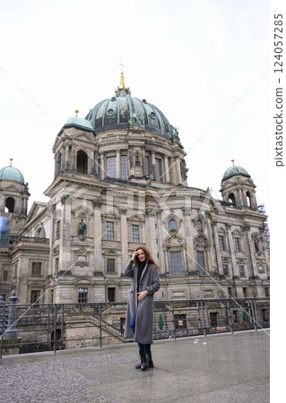 Stylish Woman Walking Near Berlin Cathedral  124057285
