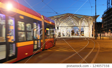 night tram riding around city. Modern tram going in evening city night tram riding around city. Modern tram going in evening city 124057338