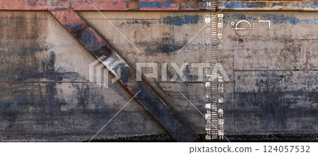 Detailed texture of a weathered industrial metal hull 124057532