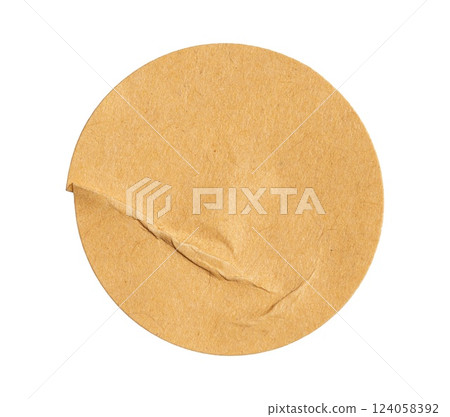 Round crumpled sticker made of recycled craft brown cutout paper with transparent background, ideal for eco friendly projects 124058392