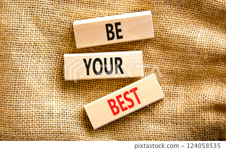 Motivational be your best symbol. Concept words Be your best on beautiful wooden blocks. Beautiful canvas table canvas background. Business motivational be your best concept. Copy space. Motivational be your best symbol. Concept words Be your best on beautiful wooden blocks. Beautiful canvas table canvas background. Business motivational be your best concept. Copy space. 124058535