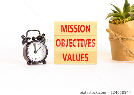 Mission objectives values symbol. Concept words Mission Objectives Values on beautiful blocks. Beautiful white background. Black alarm clock. Business mission objectives values concept. Copy space. Mission objectives values symbol. Concept words Mission Objectives Values on beautiful blocks. Beautiful white background. Black alarm clock. Business mission objectives values concept. Copy space. 124058544