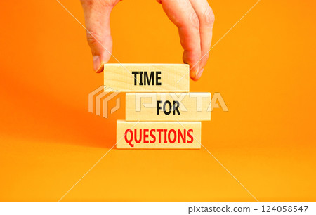 Time for questions symbol. Concept words Time for questions on beautiful wooden blocks. Beautiful orange background. Businessman hand. Business time for questions concept. Copy space. 124058547