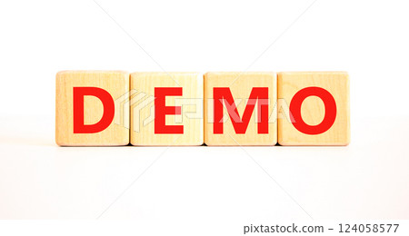 Demo symbol. Concept word Demo on beautiful wooden blocks. Beautiful white table white background. Business and demo concept. Copy space. Demo symbol. Concept word Demo on beautiful wooden blocks. Beautiful white table white background. Business and demo concept. Copy space. 124058577