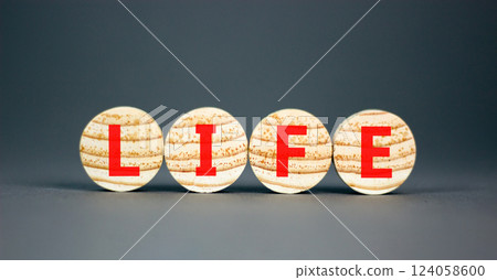 Life symbol. Concept word Life on beautiful wooden circles. Beautiful grey table grey background. Business, lifestyle, support and life concept. Copy space. Life symbol. Concept word Life on beautiful wooden circles. Beautiful grey table grey background. Business, lifestyle, support and life concept. Copy space. 124058600
