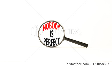 Nobody is perfect symbol. Concept words Nobody is perfect in beautiful magnifying glass. Beautiful white background. Business motivational lifestyle and nobody is perfect concept. Copy space. 124058634