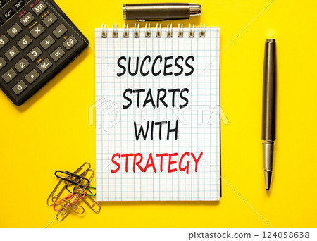 Success starts with strategy symbol. Concept words Success starts with strategy on beautiful white note. Beautiful yellow background. Business and success starts with strategy concept. Copy space. 124058638