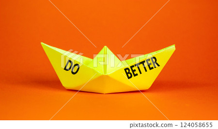 Do better symbol. Concept words Do better on beautiful yellow paper boat. Beautiful orange paper background. Business and do better concept. Copy space. Do better symbol. Concept words Do better on beautiful yellow paper boat. Beautiful orange paper background. Business and do better concept. Copy space. 124058655