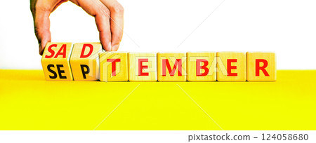September is Sadtember symbol. Concept words September is Sadtember on beautiful wooden blocks. Beautiful white background. Businessman hand. Business September is Sadtember concept. Copy space. September is Sadtember symbol. Concept words September is Sadtember on beautiful wooden blocks. Beautiful white background. Businessman hand. Business September is Sadtember concept. Copy space. 124058680