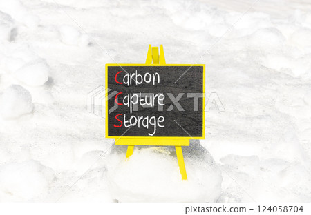 CCS Carbon capture storage symbol. Concept words CCS Carbon capture storage on beautiful yellow blackboard. Beautiful snow background. Business ecological Carbon capture storage concept. Copy space. 124058704