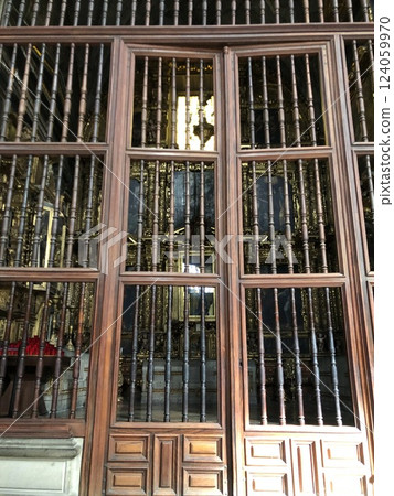 Mexico City, Mexico - 11.13.2019: Holy icons behind wooden doors in the Cathedral of the Dormition of the Blessed Virgin Mary Mexico City, Mexico - 11.13.2019: Holy icons behind wooden doors in the Cathedral of the Dormition of the Blessed Virgin Mary 124059970