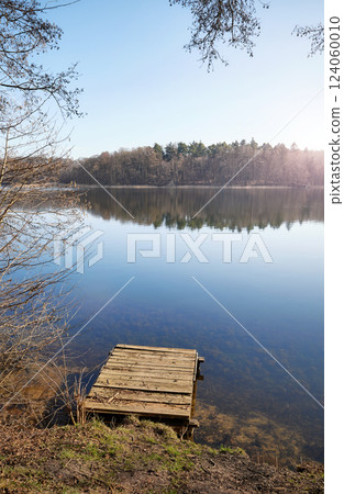Wooden pier on Lake Barlinek, West Pomeranian Voivodeship, Poland. Wooden pier on Lake Barlinek, West Pomeranian Voivodeship, Poland. 124060010