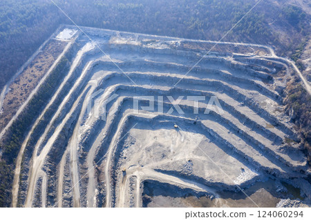 Open pit granite quarry, view from above Open pit granite quarry, view from above 124060294