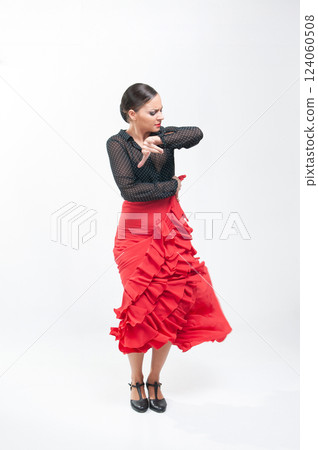 Spanish flamenco dancer in traditional dress isolated on white background for the April Fair 124060508