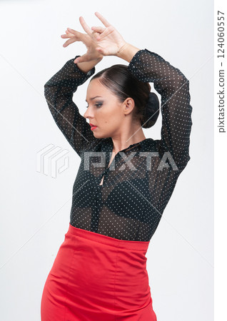 Spanish flamenco dancer in traditional dress isolated on white background for the April Fair Spanish flamenco dancer in traditional dress isolated on white background for the April Fair 124060557