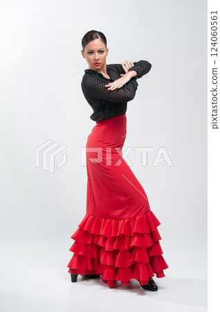 Spanish flamenco dancer in traditional dress isolated on white background for the April Fair 124060561