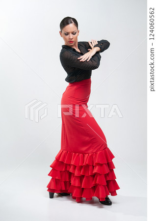 Spanish flamenco dancer in traditional dress isolated on white background for the April Fair 124060562