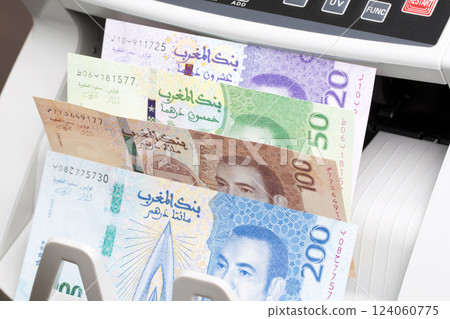 Moroccan dirham in the counting machine Moroccan dirham in the counting machine 124060775