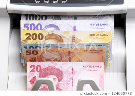 Kyrgystani Som in the counting machine 124060778