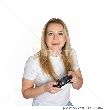 Photo of blond happy excited crazy smiling woman playing videogames addicted to playstation isolated on white background 124060867