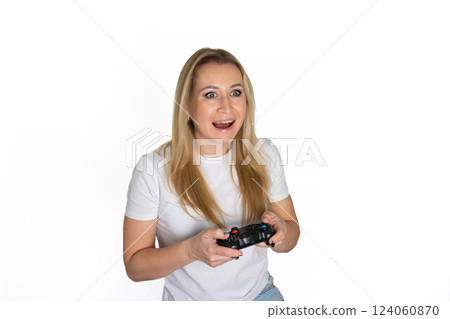 Photo of blond happy excited crazy smiling woman playing videogames addicted to playstation isolated on white background 124060870
