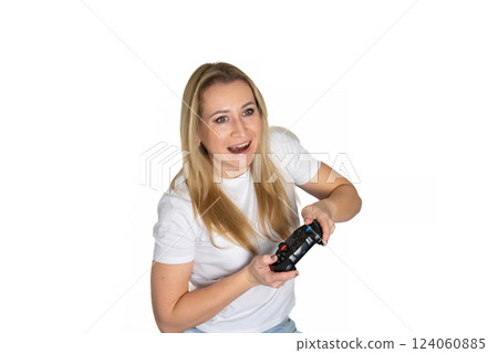 Photo of blond happy excited crazy smiling woman playing videogames addicted to playstation isolated on white background 124060885