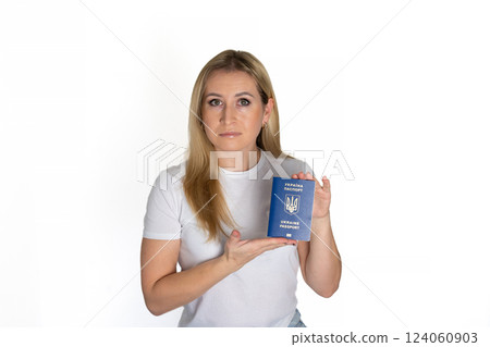 Blonde ukrainian woman in white t-shirt with Ukrainian passport, on white background Blonde ukrainian woman in white t-shirt with Ukrainian passport, on white background 124060903